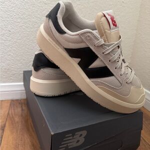 New Balance Cream and Black Athletic Shoes